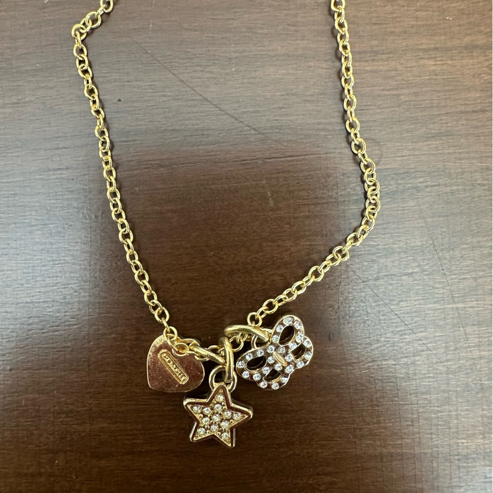 Coach gold charm necklace